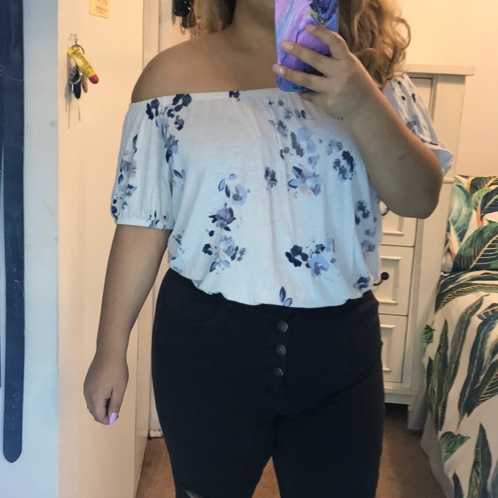 White top with blue flowers